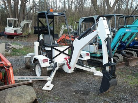 self-propelled mini excavator|tow behind mini excavator.